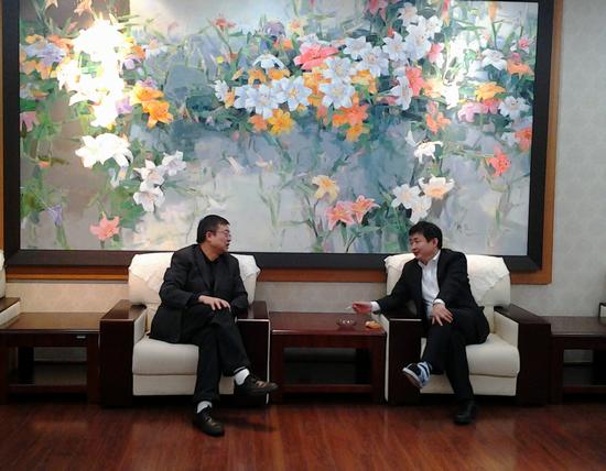 卢冠忠与丁奎岭进行会后交谈